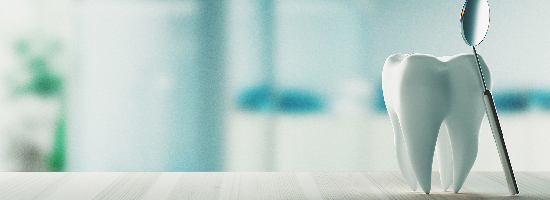 The image shows a close-up of a toothbrush with a toothpaste tube in the background, set against a blurred backdrop that suggests a dental office or waiting room.